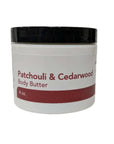Patchouli & Cedarwood Body Butter jar showing label, designed for deep hydration and soothing sensitive skin