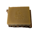 Natural bar soap with carrot and turmeric for glowing skin, offering a refreshing cleansing experience.