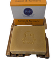 Natural bar soap with carrot and turmeric for glowing skin, offering a refreshing cleansing experience.