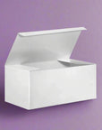 White gift box with lid on purple background, elegant and durable design for sophisticated gift presentation.