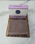 Lavender bar soap with packaging on a marble surface