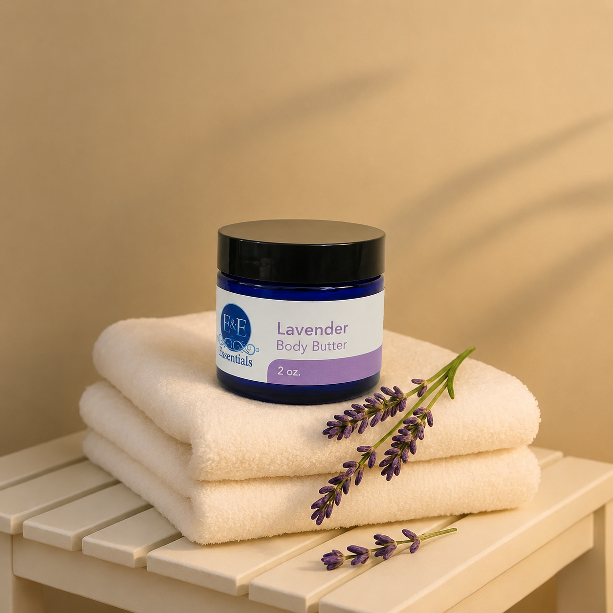 Lavender Whipped Body Butter on towels with fresh lavender, ideal for dry, sensitive skin hydration
