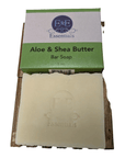 Bar of soap with a green and white box labeled 'E&E Essentials Aloe & Shea Butter Bar Soap' on a white background.