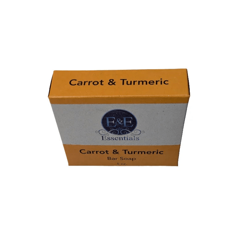 Carrot &amp; Turmeric Bar Soap in branded packaging, formulated for dark spot and eczema care