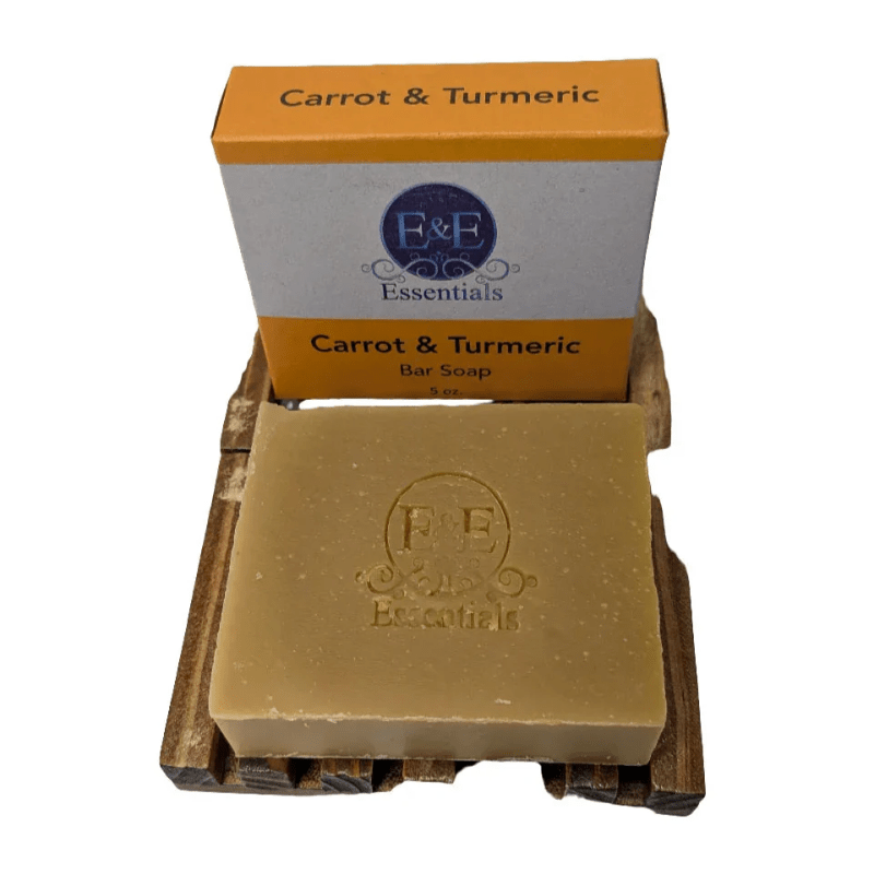 Carrot &amp; Turmeric Bar Soap by E &amp; E Essentials, shown in packaging on bright background