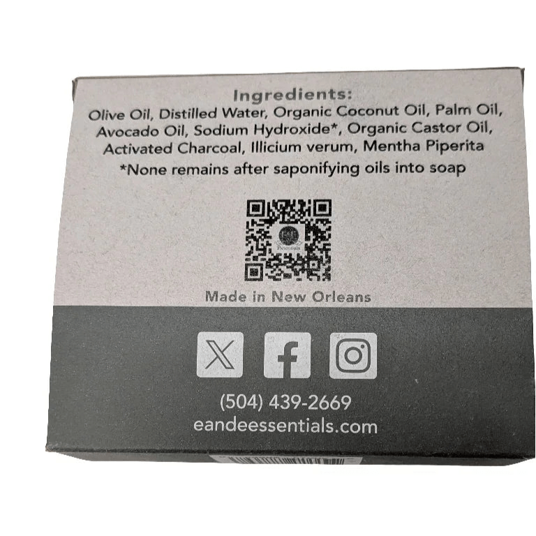 Activated charcoal soap box with ingredient list including olive oil, coconut oil, palm oil, for natural cleansing
