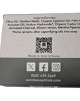 Activated charcoal soap box with ingredient list including olive oil, coconut oil, palm oil, for natural cleansing