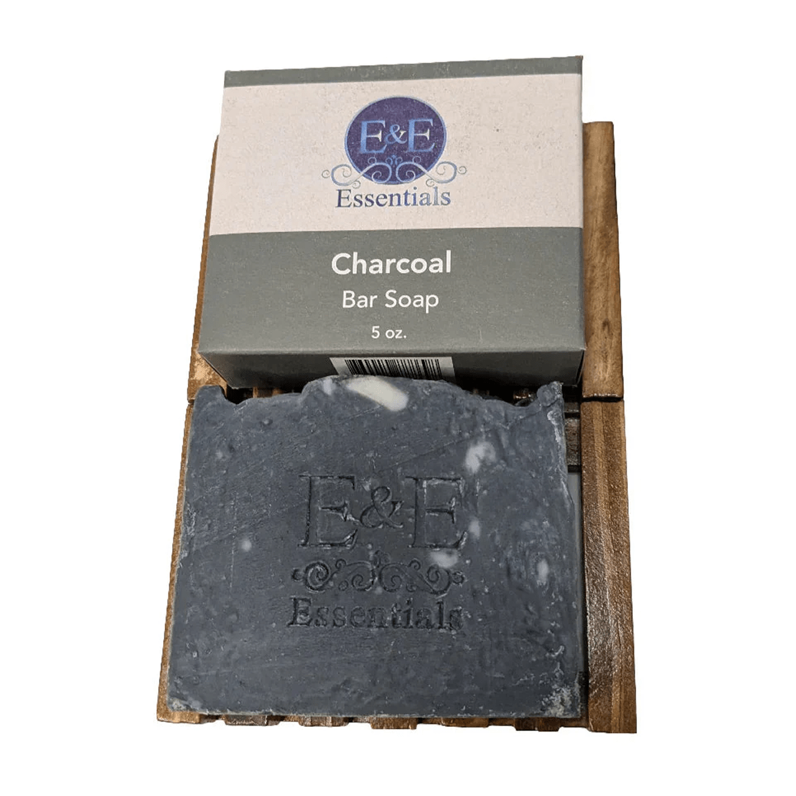 Charcoal bar soap on white background featuring E &amp; E Essentials branding, natural acne solution