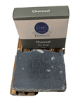 Charcoal bar soap with E & E Essentials label on white background, cold process detox cleanser