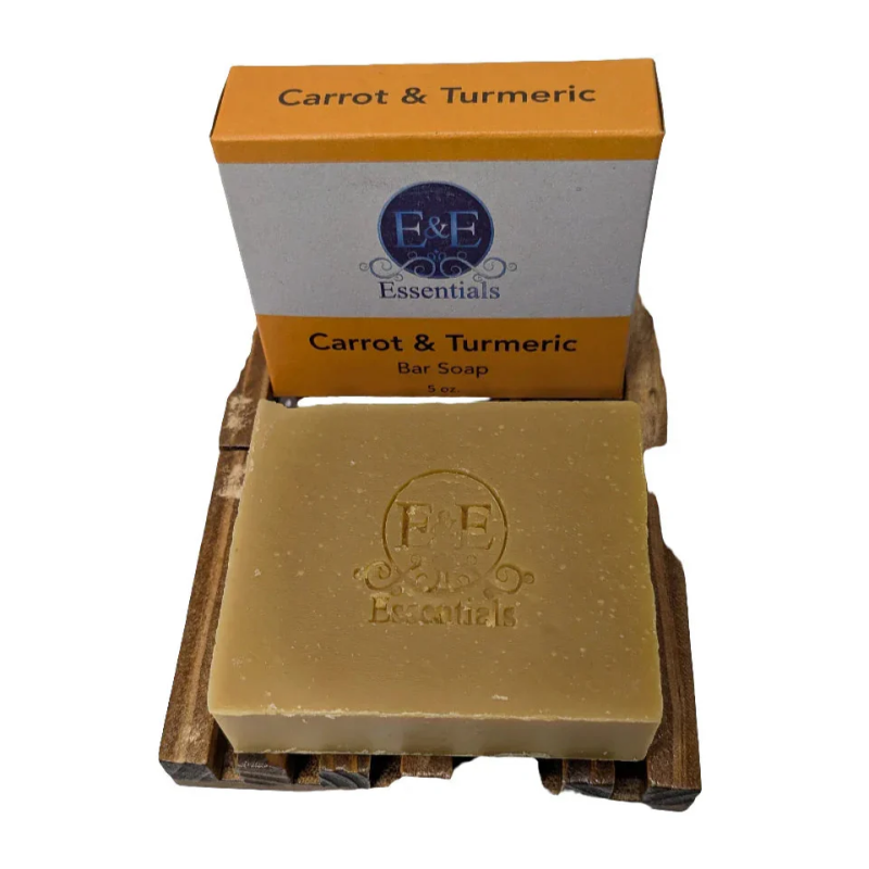 Carrot & Turmeric bar soap with packaging on a white background