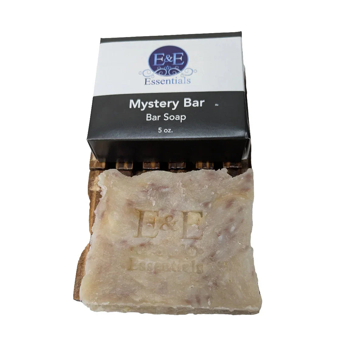 Bar of soap with a black box labeled 'E&E Essentials' on a white background