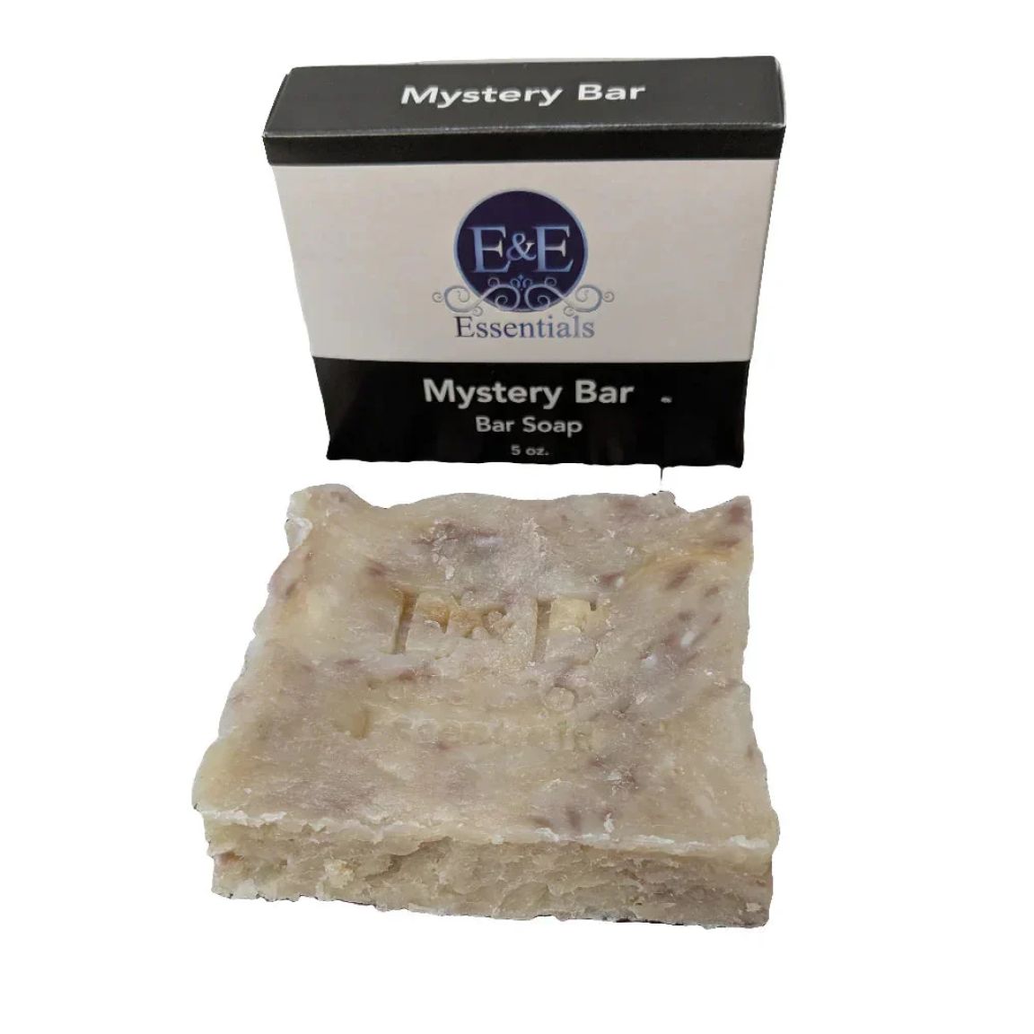 Bar of soap with a packaging box labeled 'Mystery Bar' on a white background