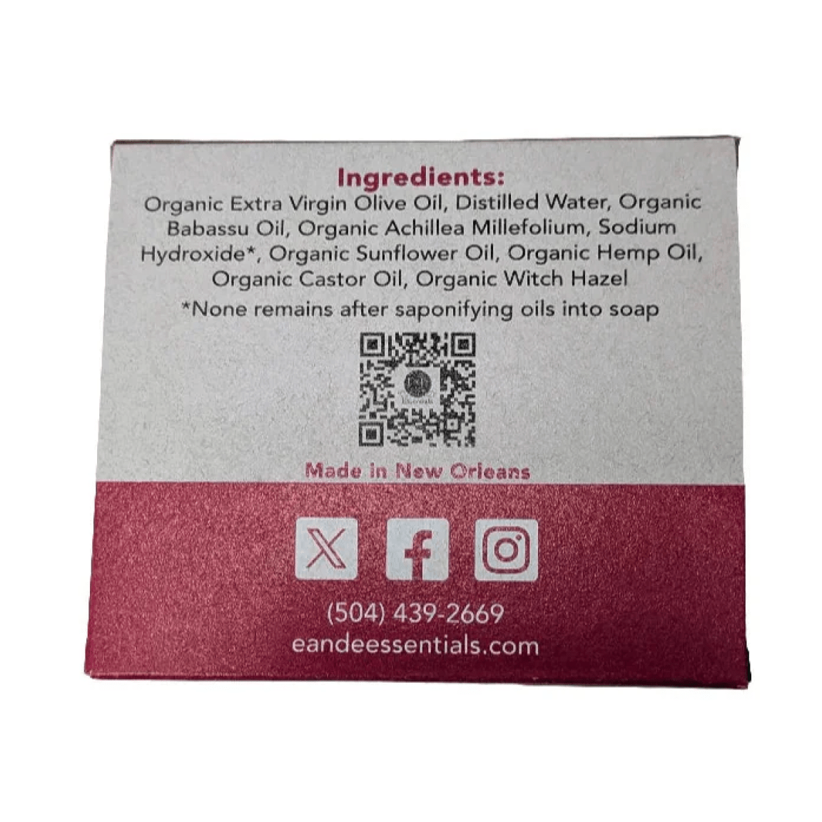 Product label with ingredients list and contact information on a white background