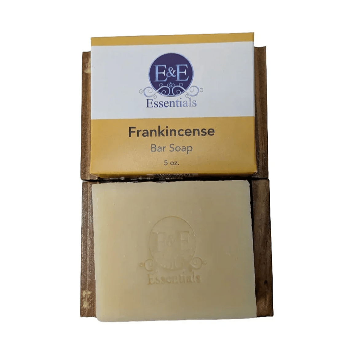 Frankincense bar soap with packaging on a white background