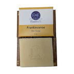 Frankincense bar soap with packaging on a white background