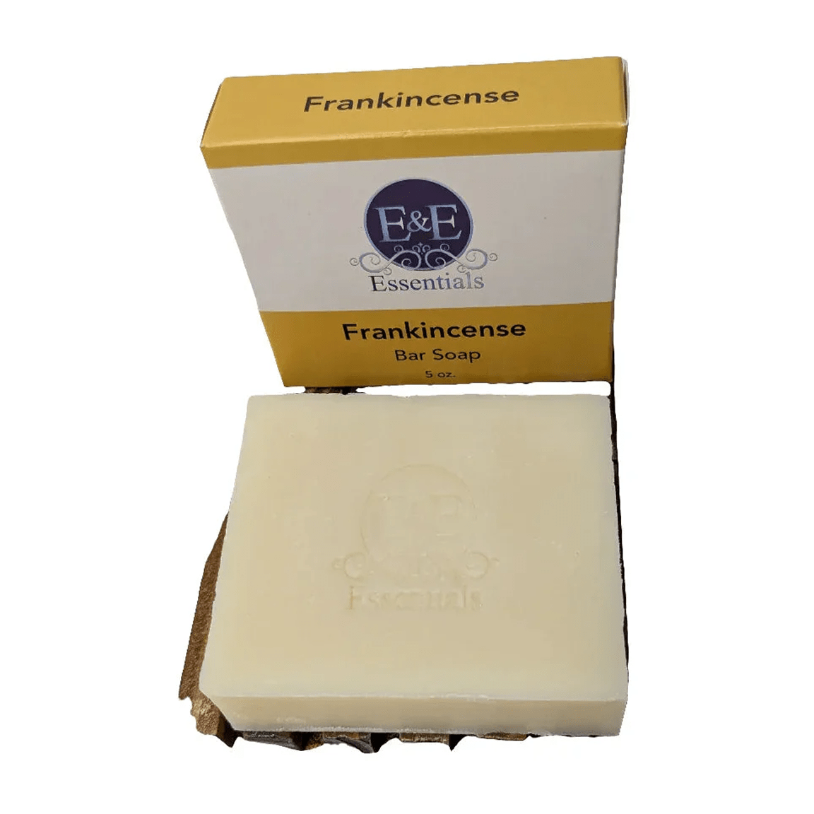 Frankincense bar soap with packaging on a white background