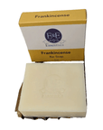 Frankincense bar soap with packaging on a white background