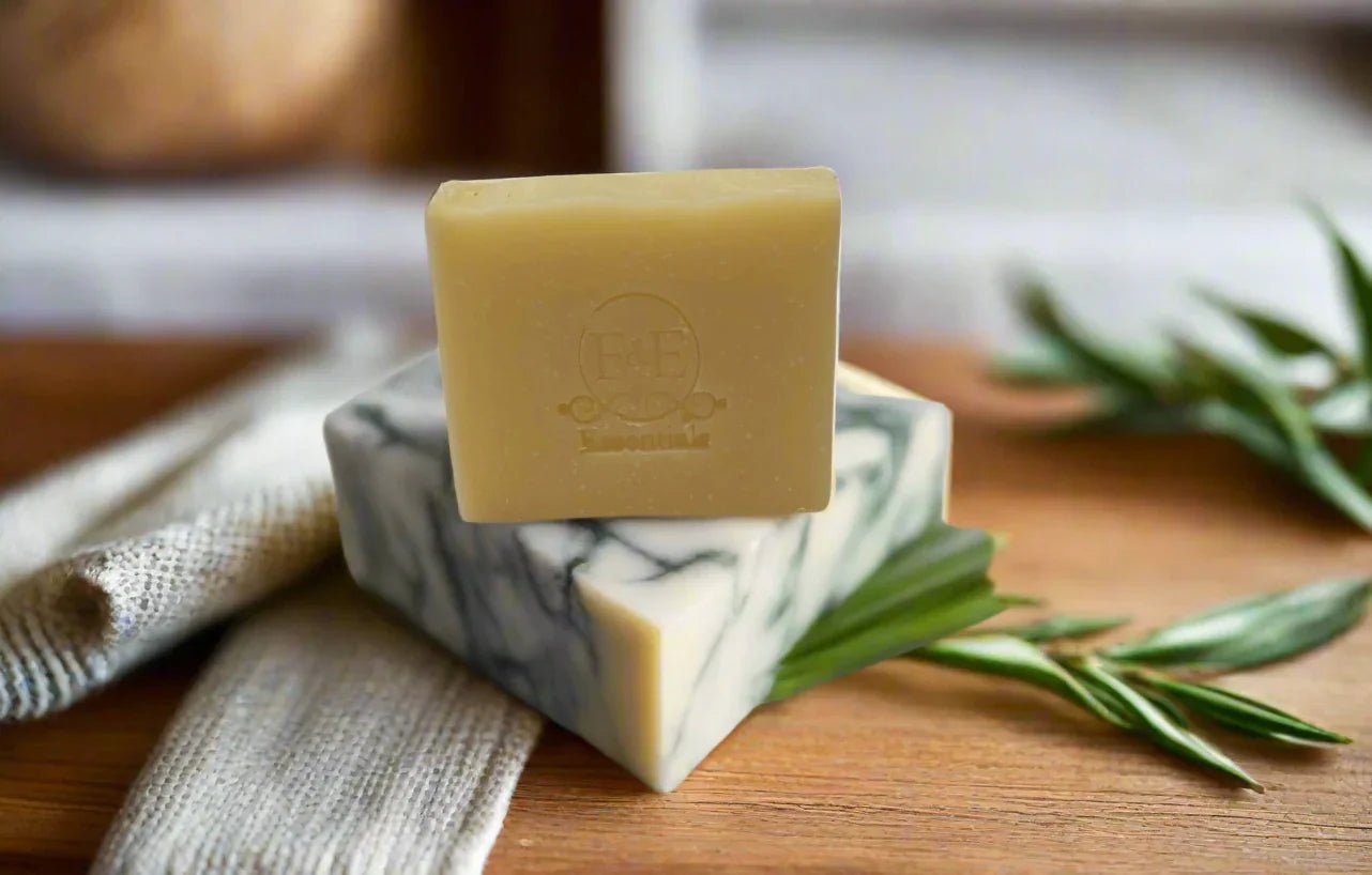 Lemongrass Bar Soap for sensitive skin with natural oils, eco-friendly, displayed on wooden surface with greenery