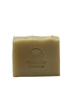 Angled view of Patchouli & Cedarwood natural soap bar with visible texture