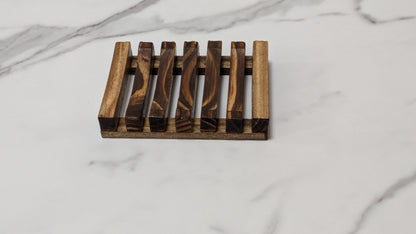 Top view of a wooden soap dish with a minimalist design