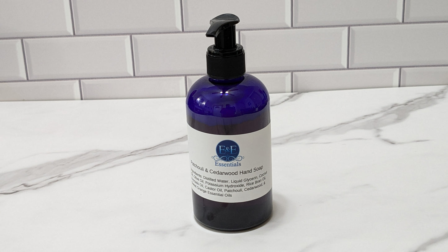 Patchouli & Cedarwood hand soap in a dispenser bottle on a kitchen counter