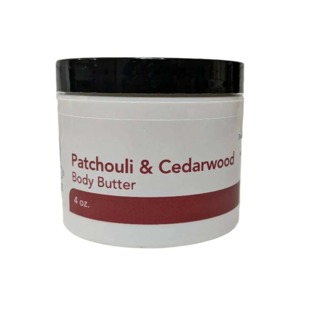Patchouli & Cedarwood Body Butter jar, providing deep hydration with a soothing, earthy aroma.
