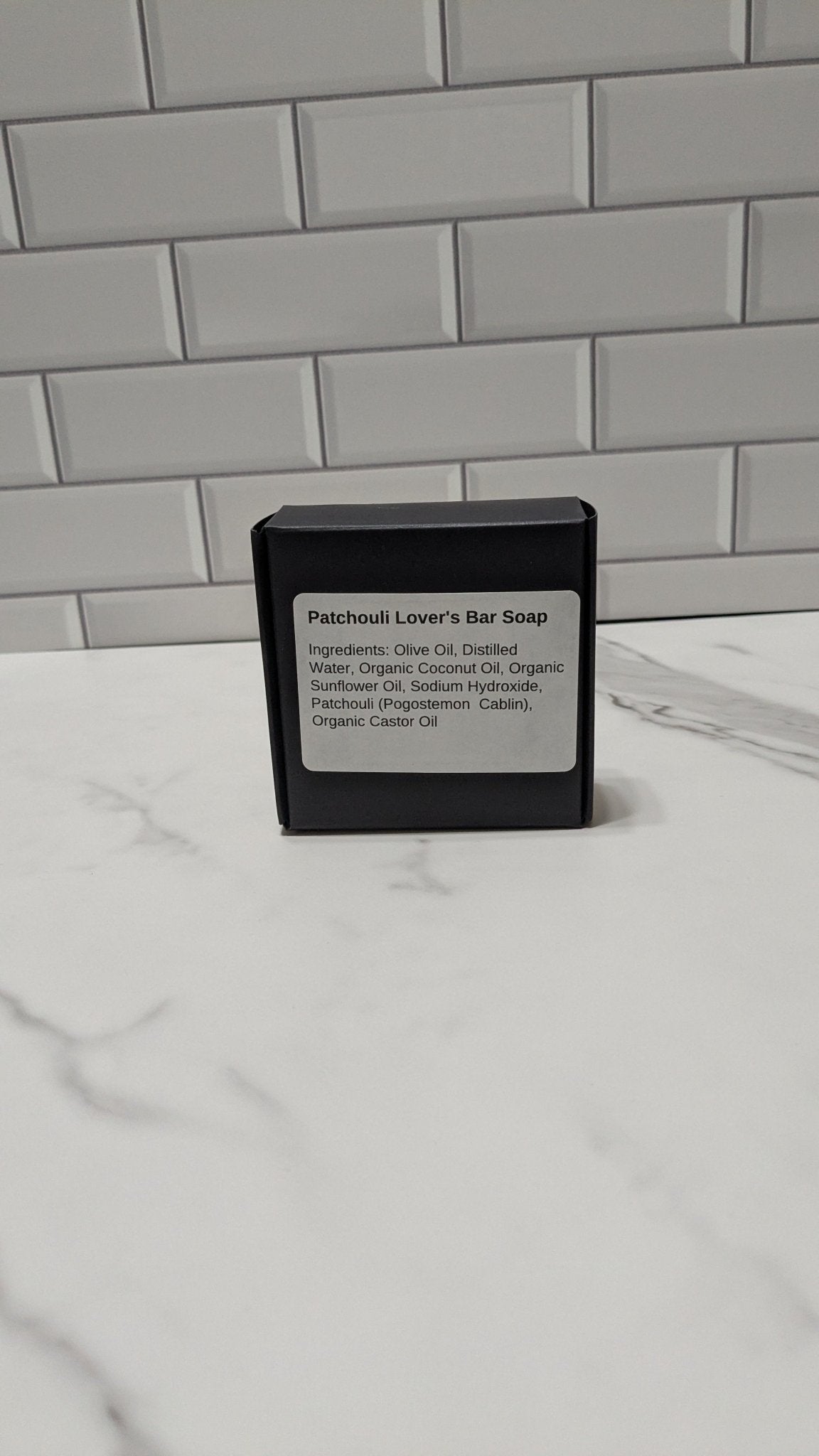 Patchouli Moisturizing Bar Soap in black container, vegan hydrating formula by E &amp; E Essentials