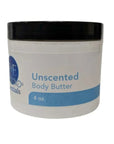 Whipped unscented body butter jar for dry, sensitive skin, displayed with cocoa and shea butter ingredients
