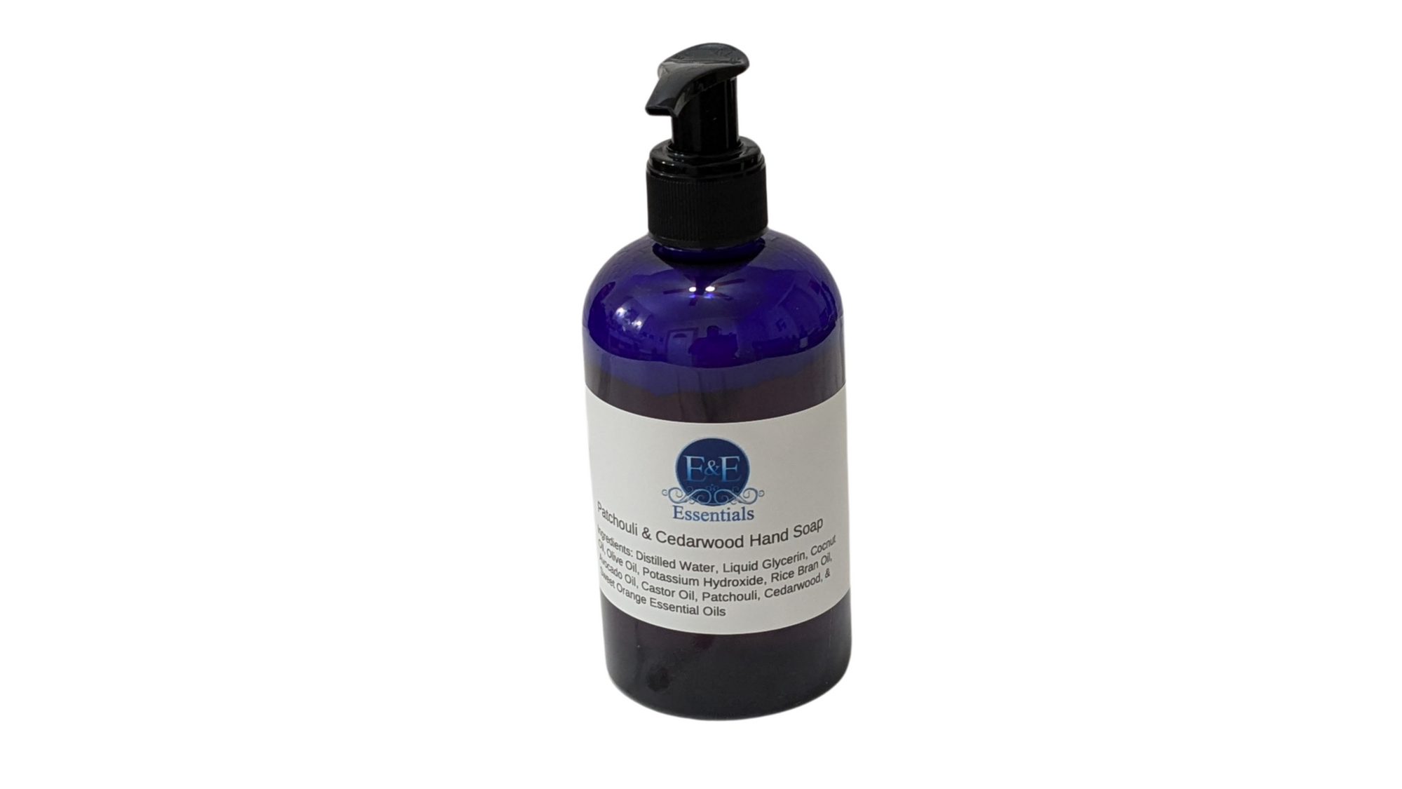 Pump bottle of Patchouli & Cedarwood liquid hand soap against a neutral background