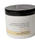 Whipped Vanilla Body Butter in jar with visible label listing shea, cocoa butter, and vanilla oleoresin