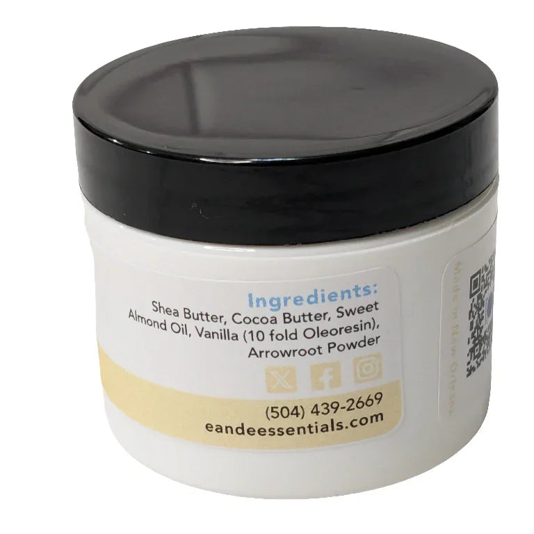 Whipped vanilla body butter jar with list of natural ingredients, providing deep hydration.