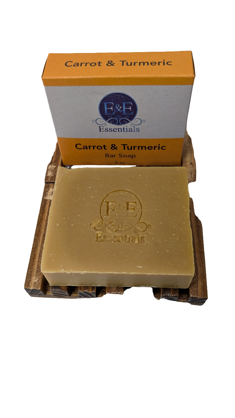 Natural bar soap with carrot and turmeric for glowing skin, offering a refreshing cleansing experience.