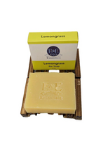 Lemongrass Bar Soap on wooden tray, perfect for sensitive skin, with packaging.
