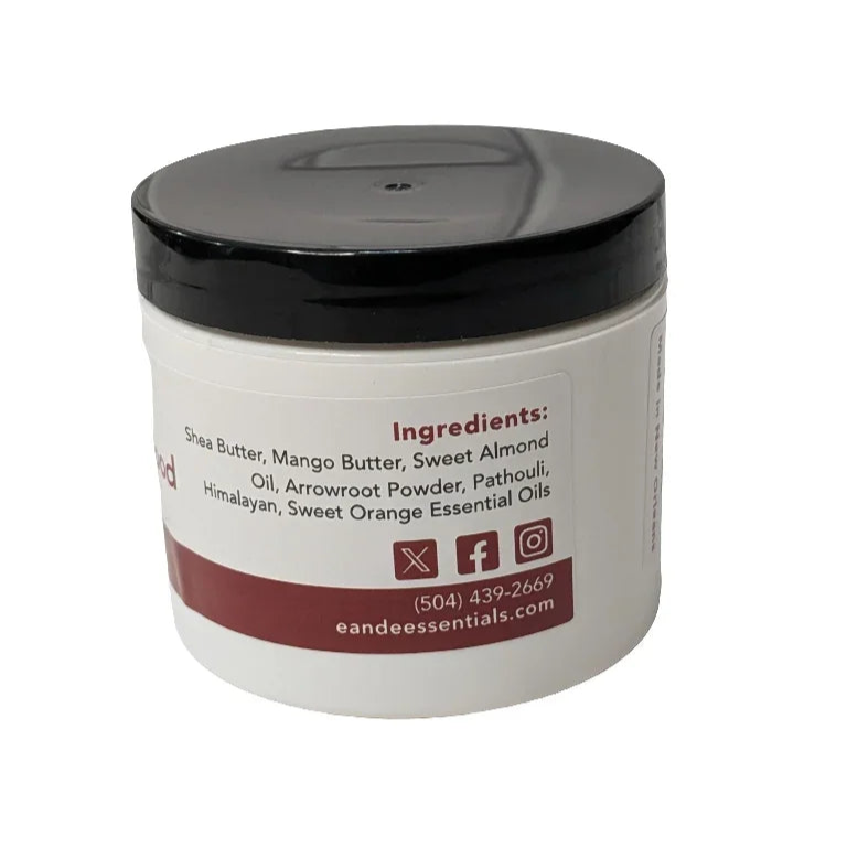 Patchouli & Cedarwood Body Butter jar with natural ingredients label.