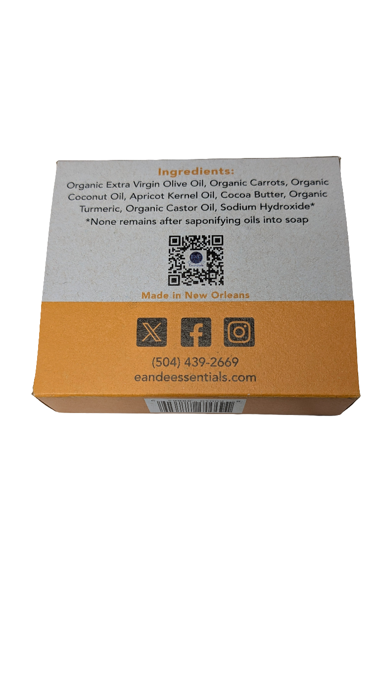 Natural bar soap with carrot and turmeric for glowing skin, offering a refreshing cleansing experience.