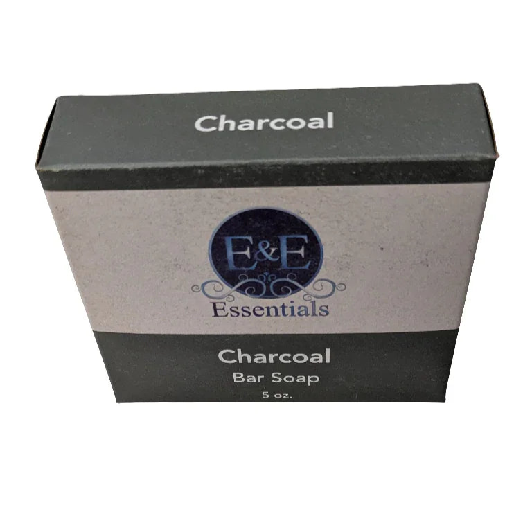 Activated charcoal bar soap packaging with E&E Essentials branding.