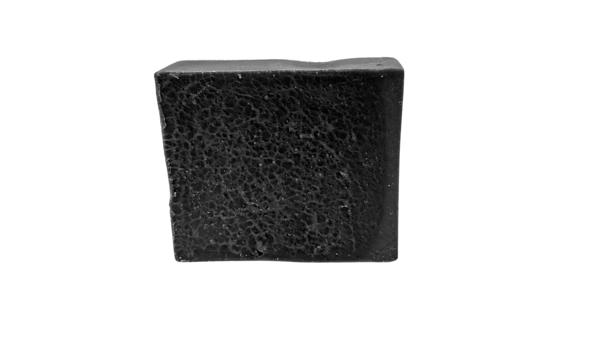 Charcoal bar soap showcased against a white background for contrast