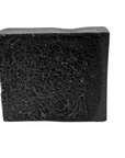 Charcoal bar soap showcased against a white background for contrast