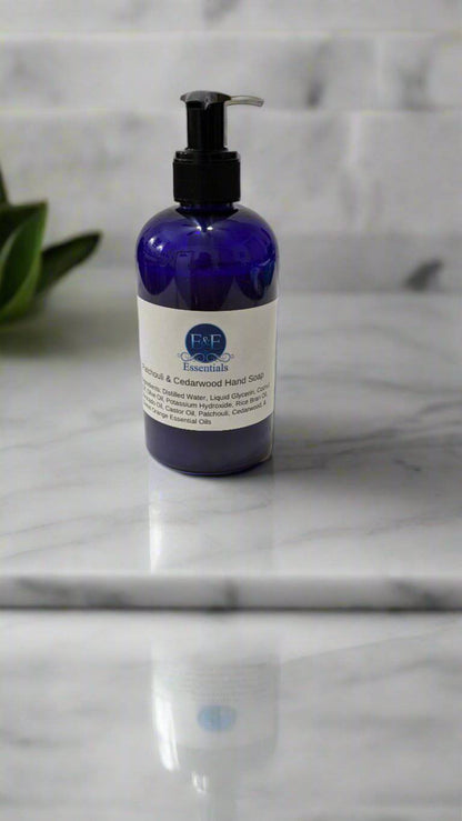 Patchouli & Cedarwood scented liquid hand soap on a marble countertop