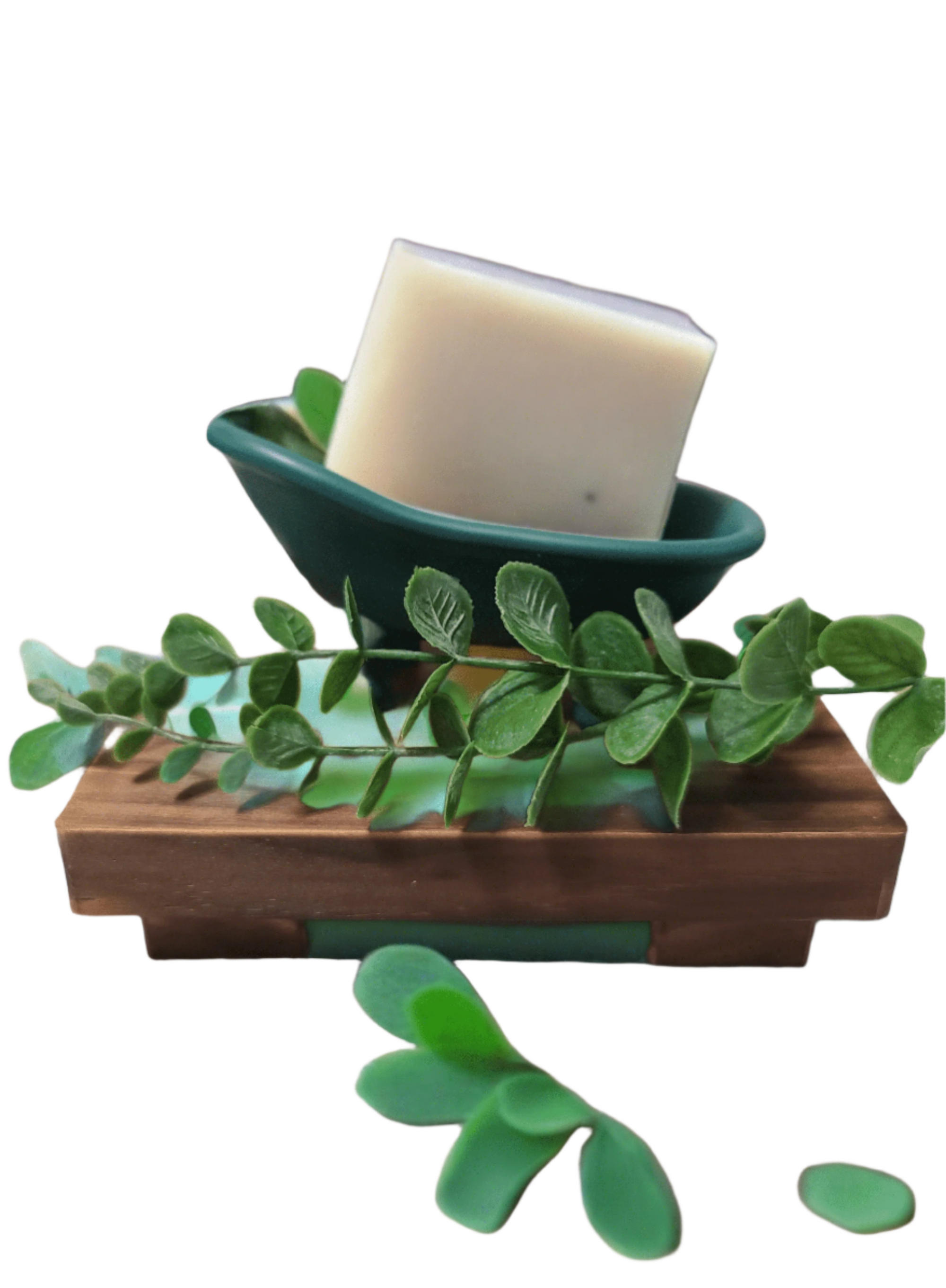 Eucalyptus &amp; Mint Bar Soap on a wooden holder with eucalyptus leaves for decoration