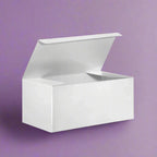 White gift box with lid on purple background, elegant and durable design for sophisticated gift presentation.