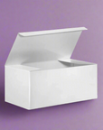 Elegant white gift box against a contrasting purple background