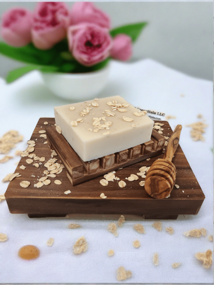 Oatmeal & Honey Bar Soap displayed on a wooden tray with a decorative spoon