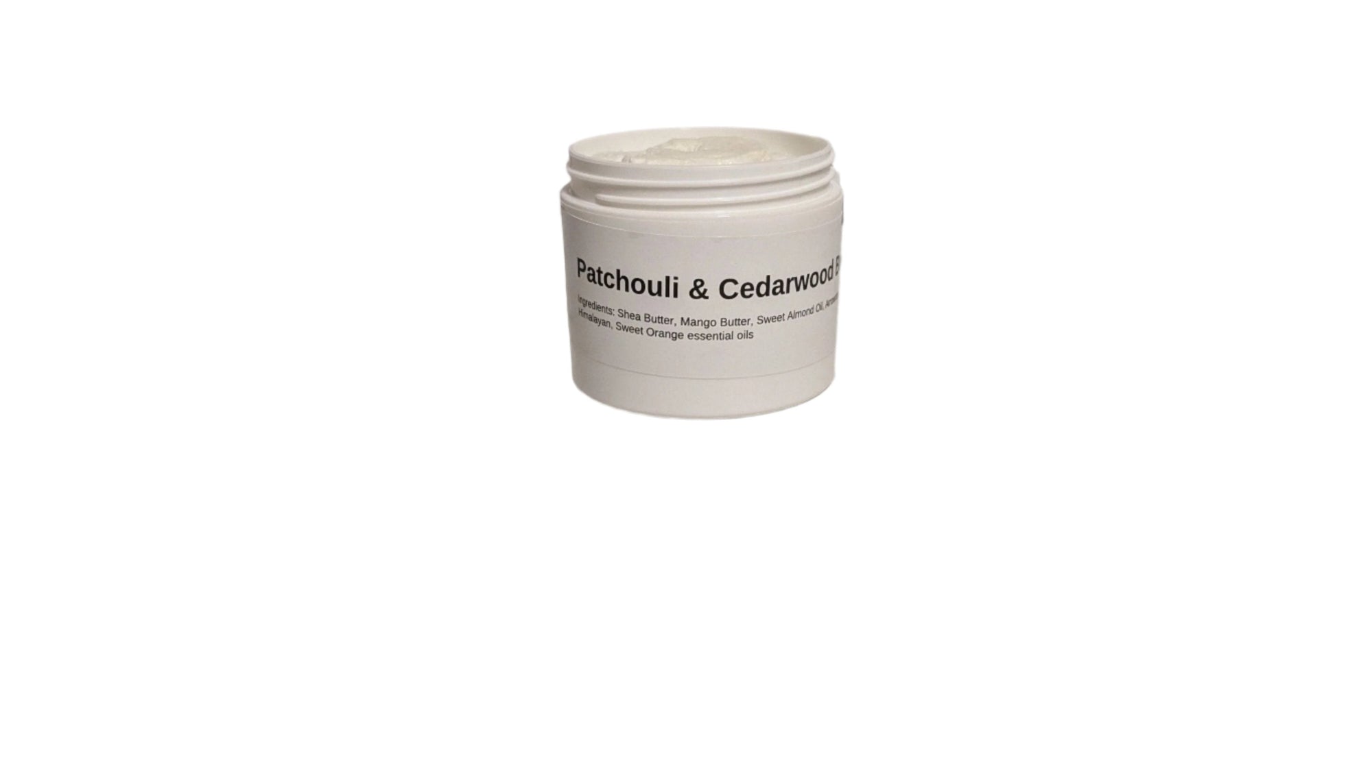 A container of Patchouli & Cedarwood Body Butter on a white surface