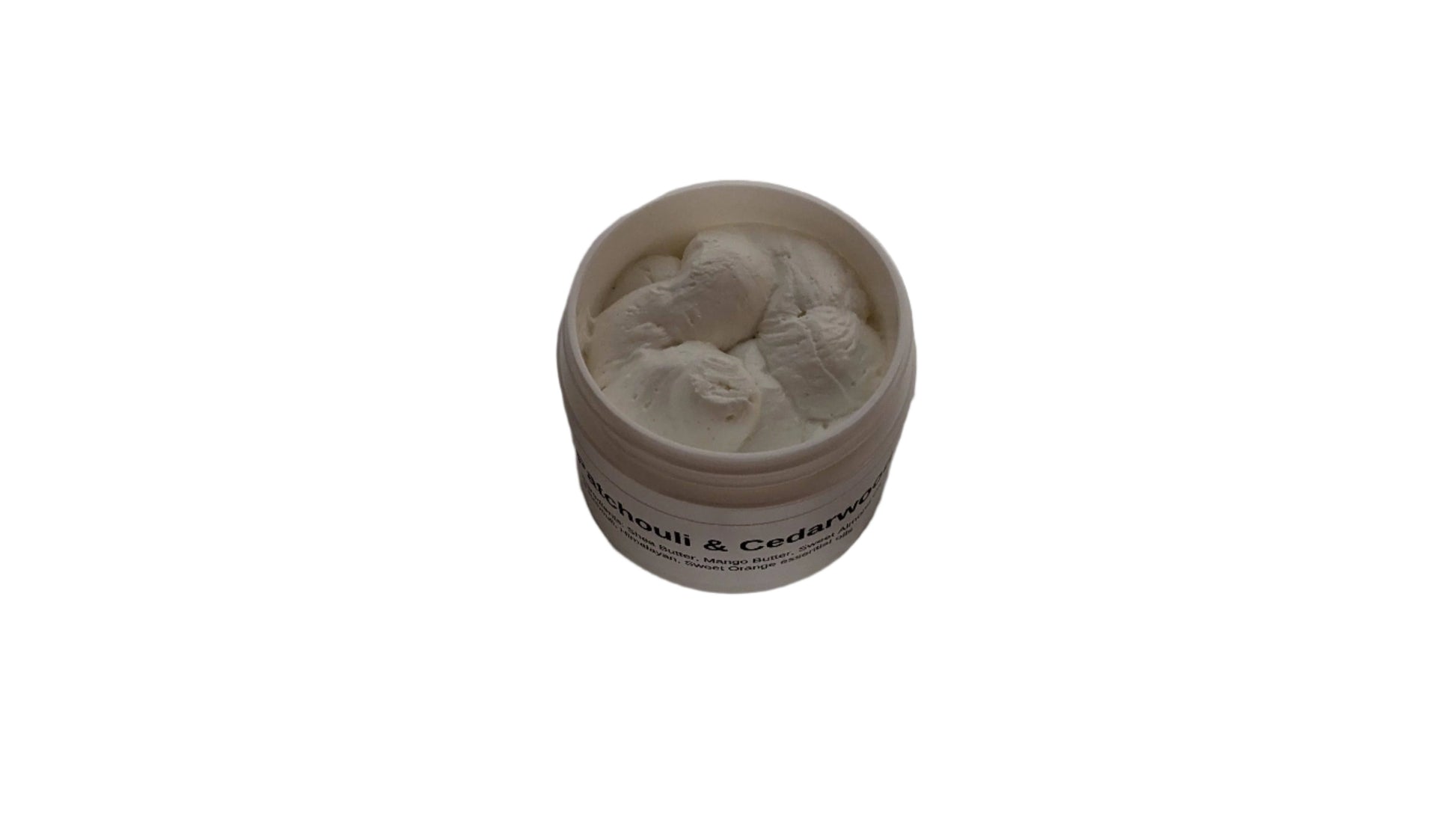 Patchouli & Cedarwood Body Butter container with a closed lid on white