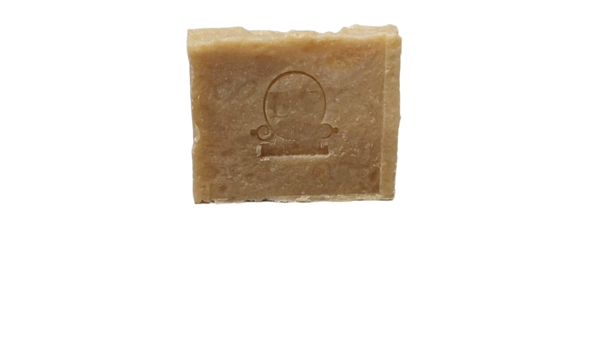 Close-up of Sea Moss & Tea Tree Bar Soap showcasing the embossed logo