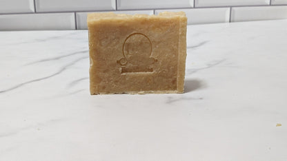 Sea Moss & Tea Tree Bar Soap featuring the brand's logo