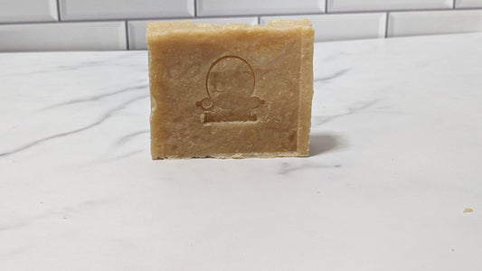 Sea Moss & Tea Tree Bar Soap featuring the brand's logo