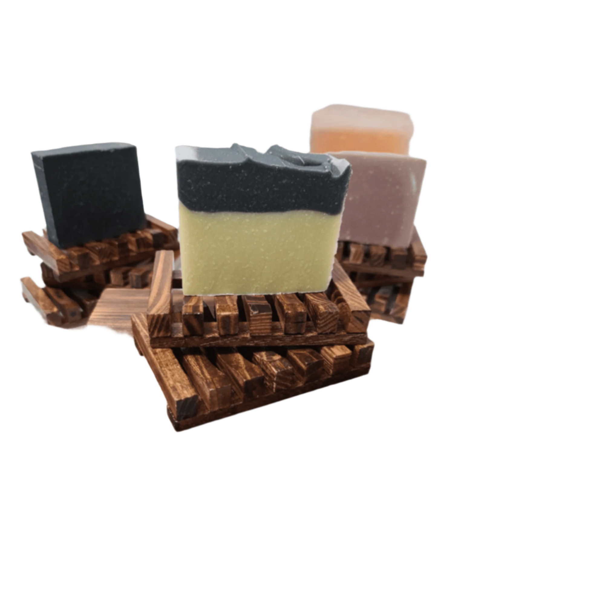 Multiple soap bars arranged on a slatted wooden dish in a bathroom setting