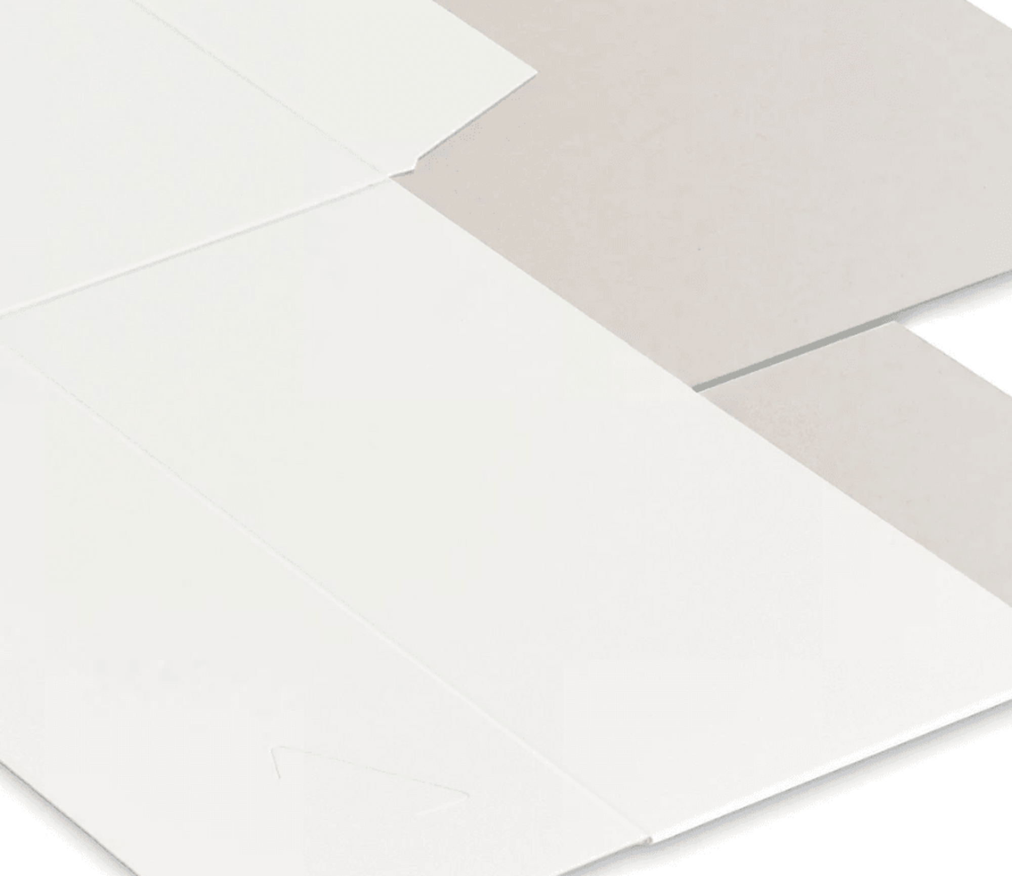 White gift box ribbon on a smooth white surface